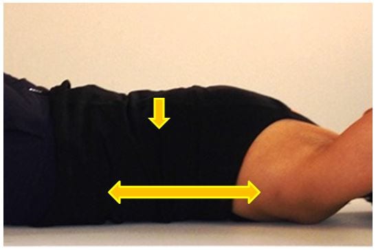 side image of man lying down with good ribcage placement